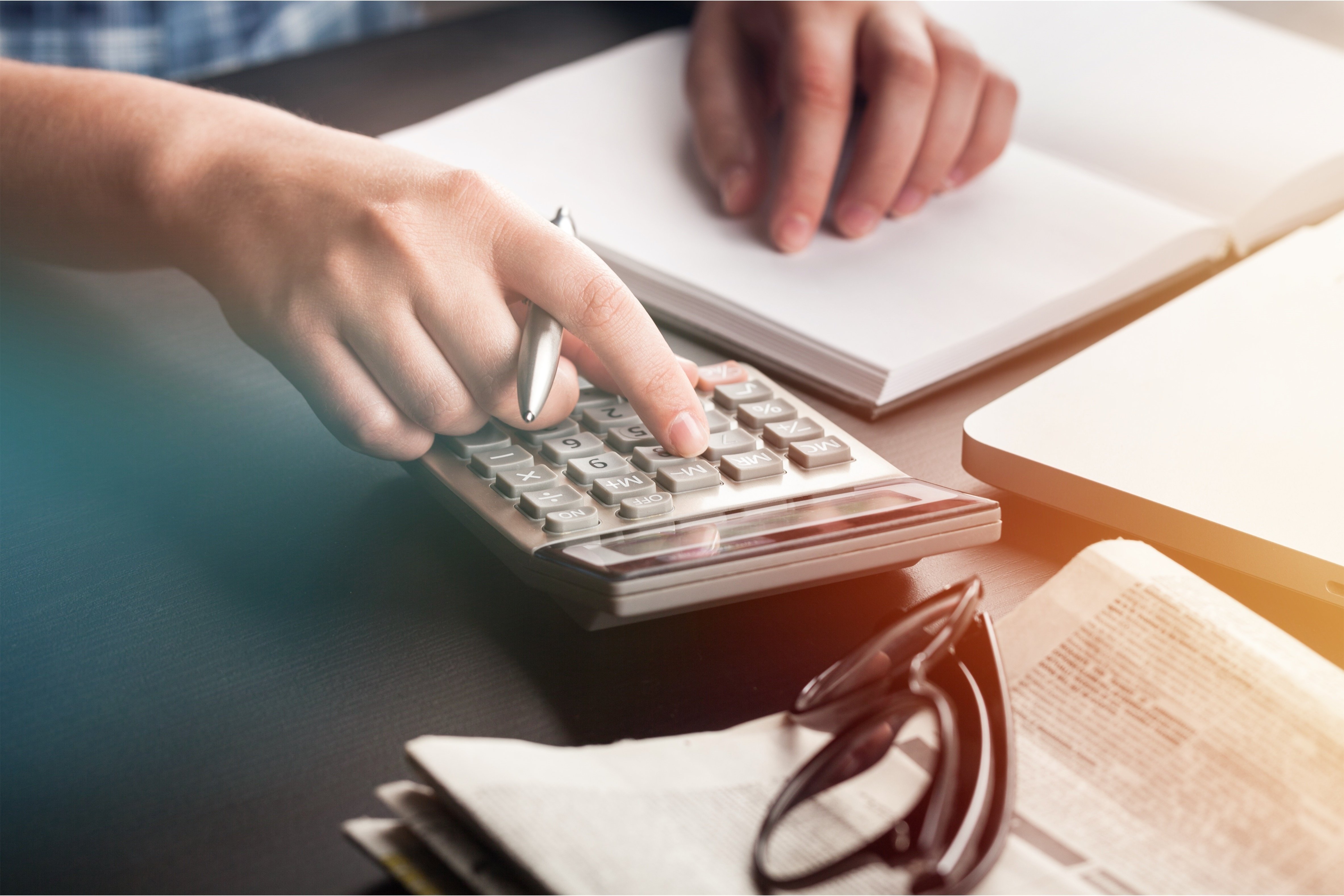 Small business owner processing payroll