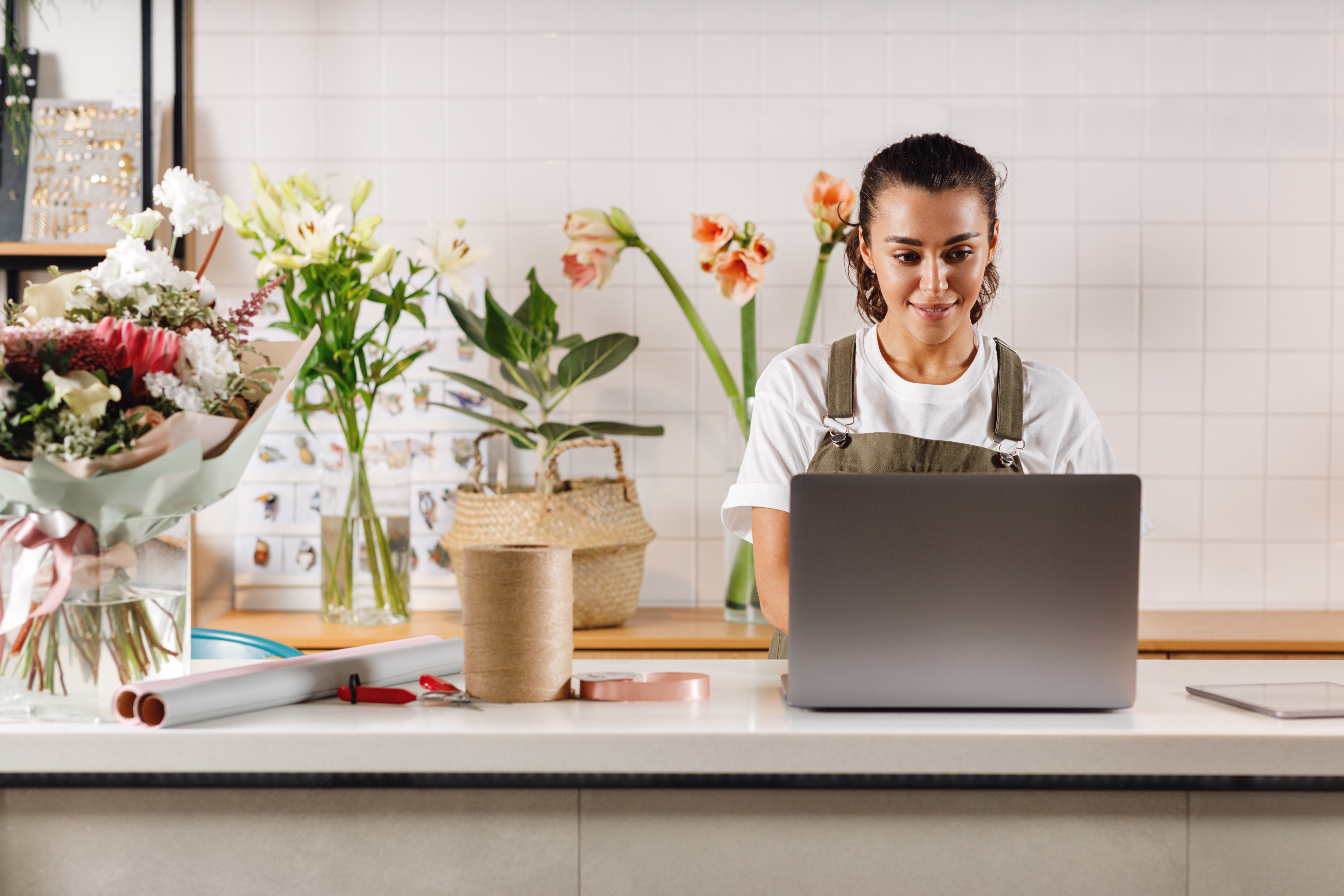 Small business owner working on laptop