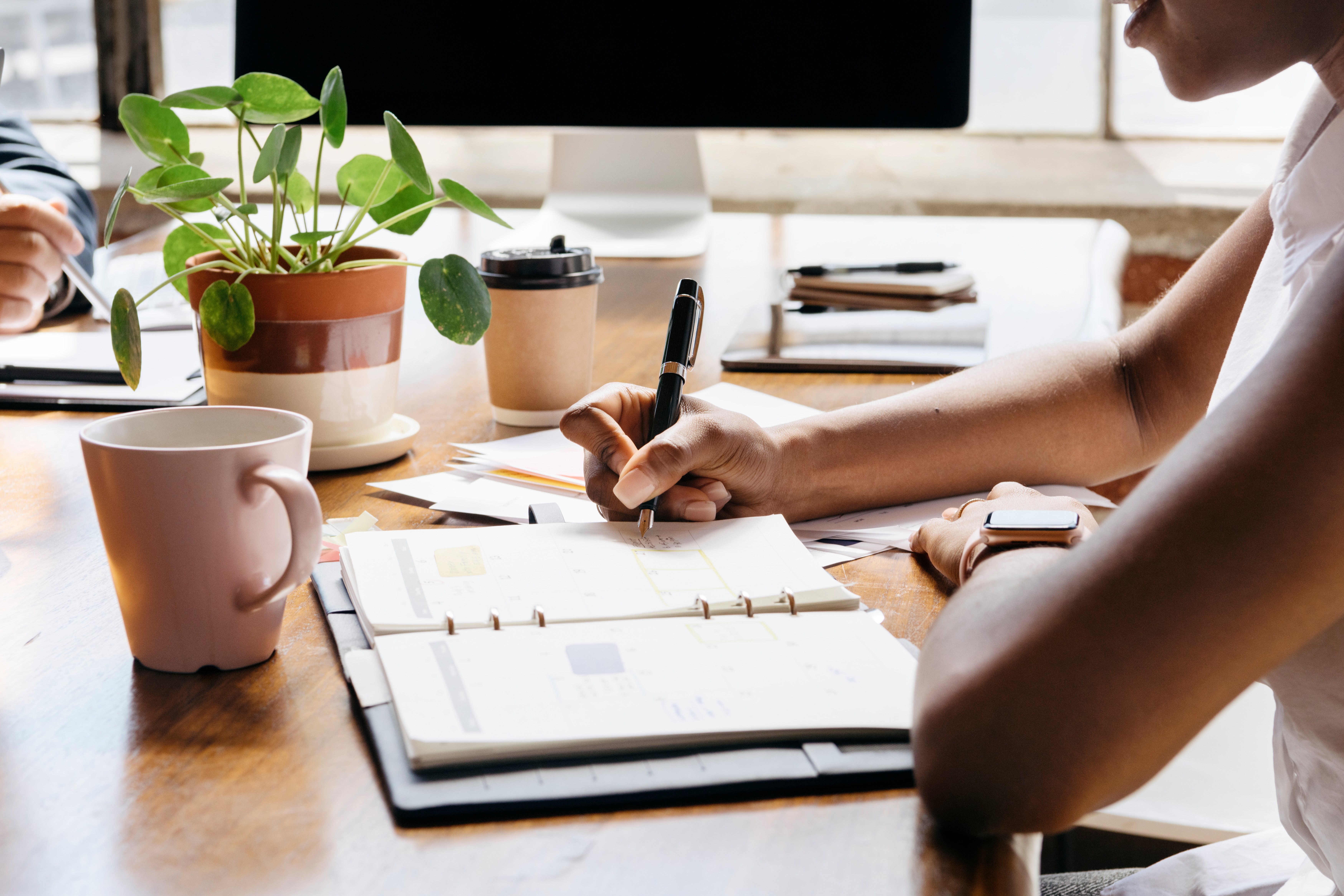 Fractional executive assistant managing appointments and meetings in calendar