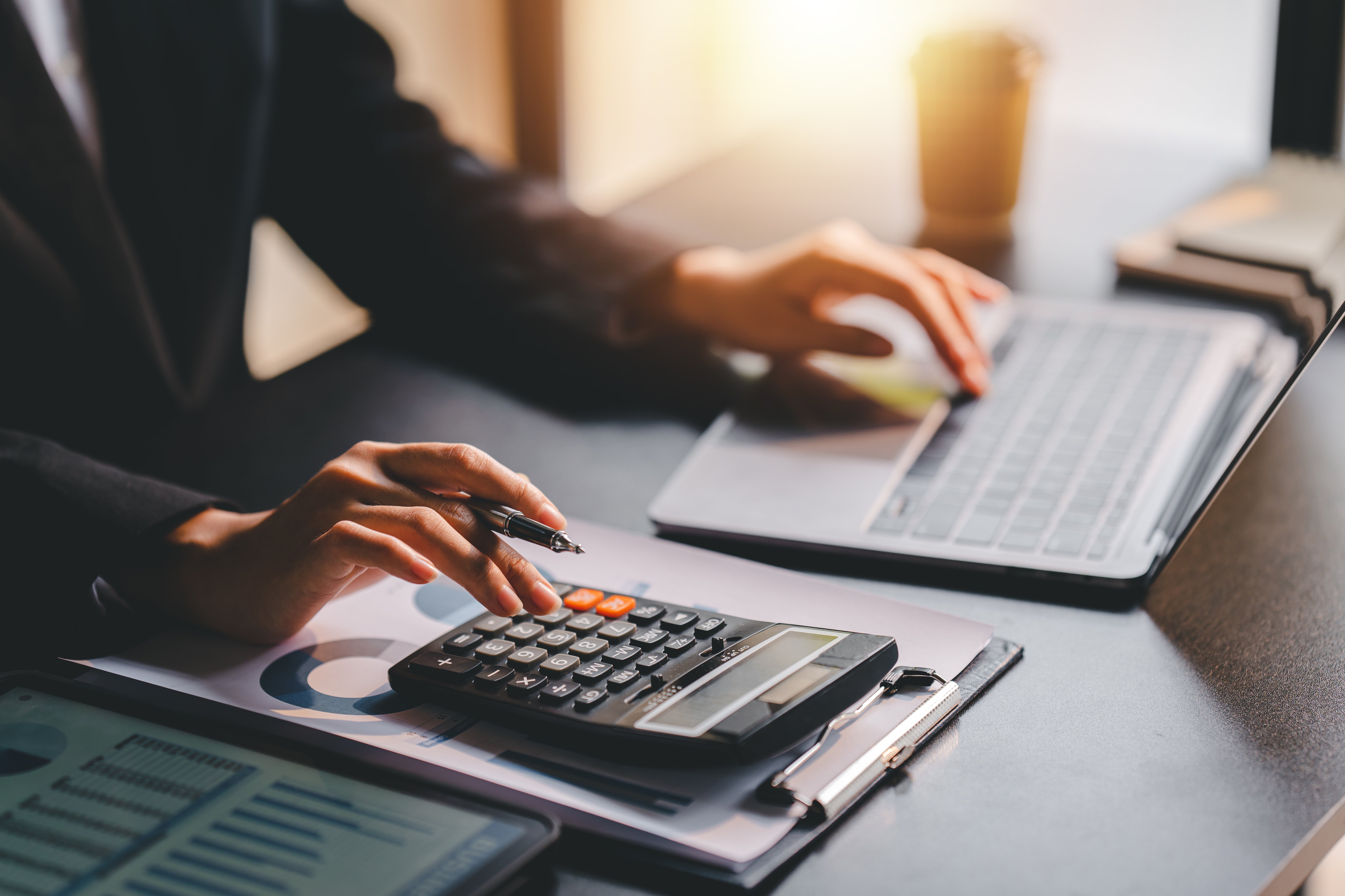 Accounting services specialist calculating tax deductions